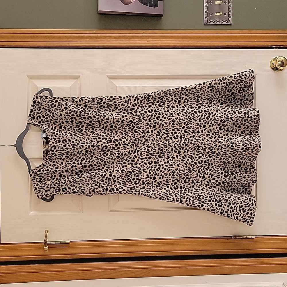 From She + Sky size L animal print sleeveless dress.